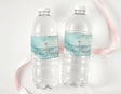 Teal marble christening drink bottle labels on two clear plastic bottles
