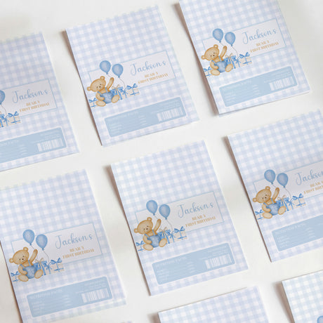 Blue gingham teddy bear chocolate wrappers with balloons, name, and price fields