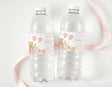 Two clear water bottles with pink teddy bear birthday labels, Ruby is