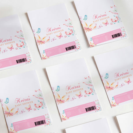 Set of baby shower chocolate wrappers with watercolor butterflies and pink text