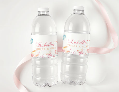 Personalised water bottle labels with butterfly artwork and birthday name on two bottles