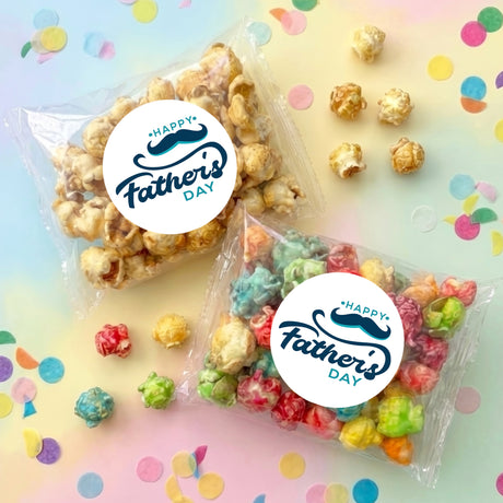 Clear plastic popcorn bag with Happy Father's Day sticker, filled with colorful popcorn