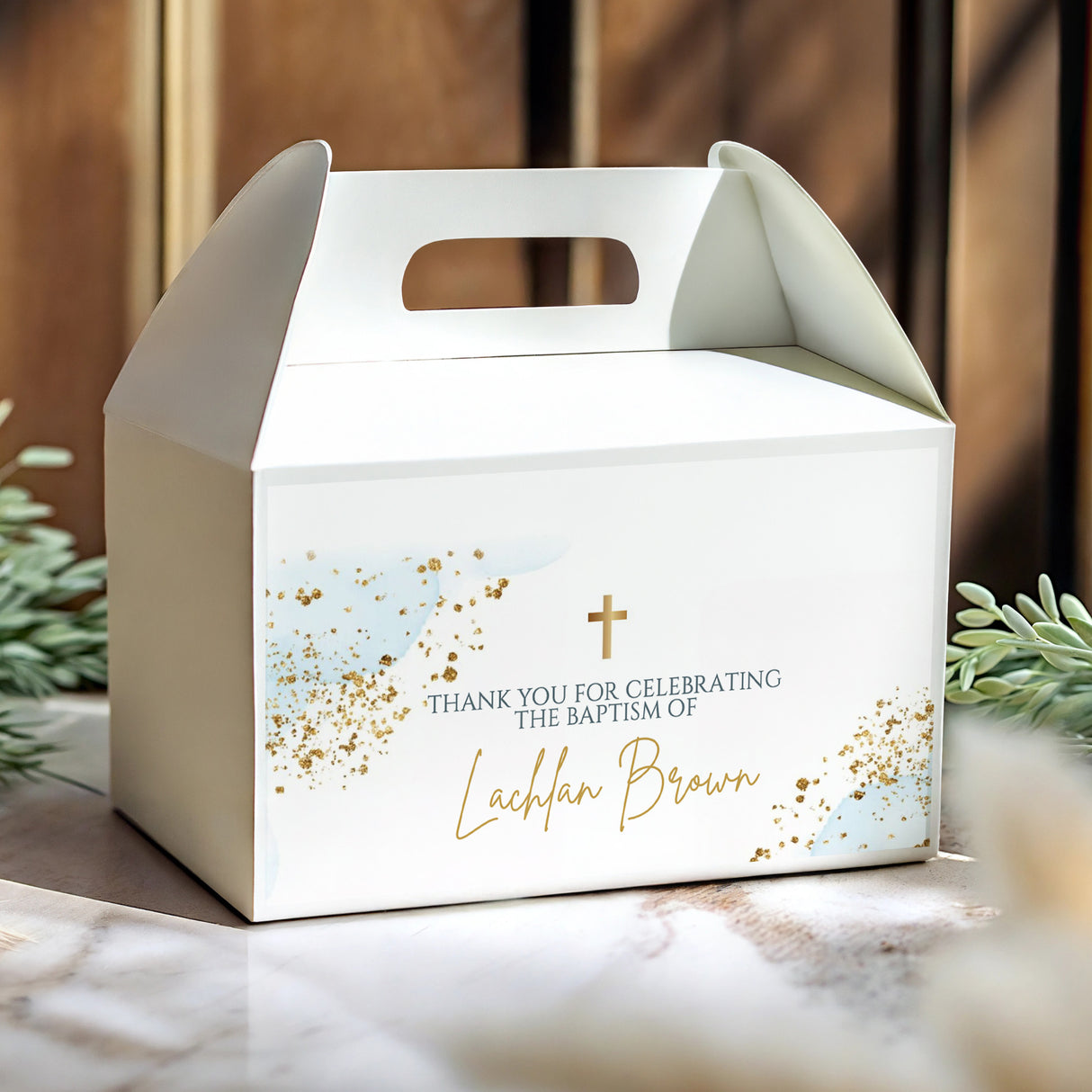 White gable baptism favour box with gold watercolor speckles, cross, and personalised name
