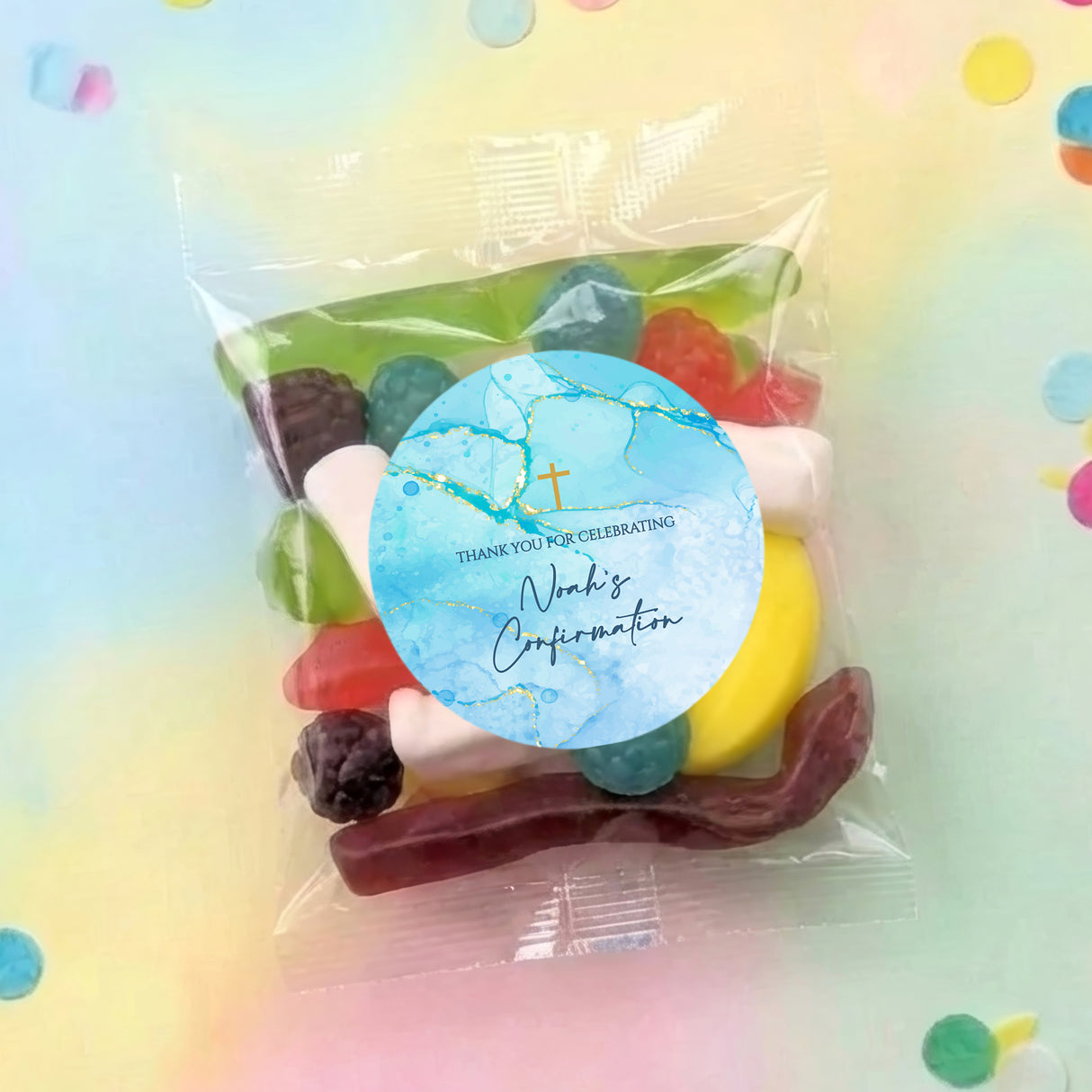 Personalised party mix lolly bag with round blue Confirmation label and mixed sweets