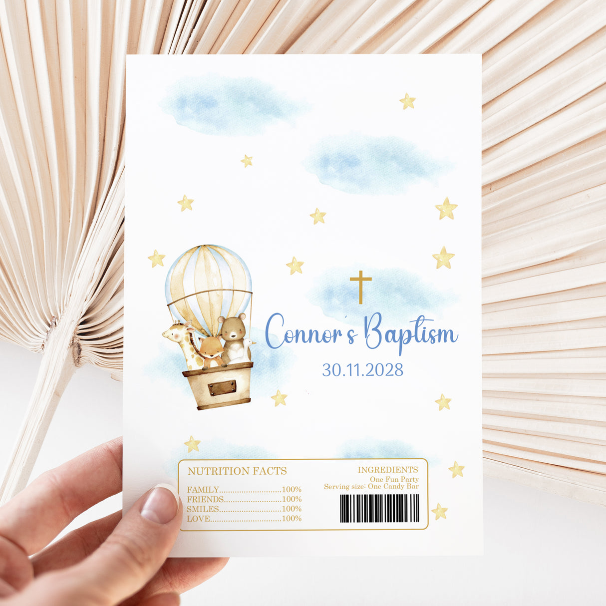 Baptism chocolate wrapper with hot air balloon animals, gold stars, 'Connor's Baptism'.
