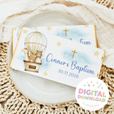 Chocolate bar wrapper with hot air balloon animals, gold crosses, blue “Connor’s Baptism”