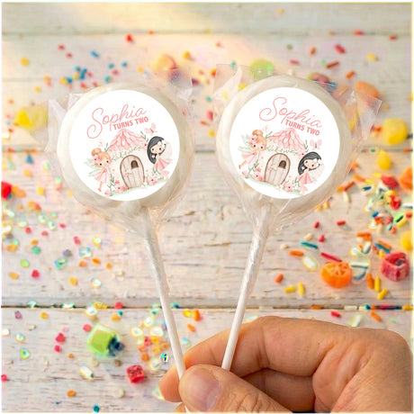Personalised lollipops on sticks with round Sophia turns two labels, multi-color border