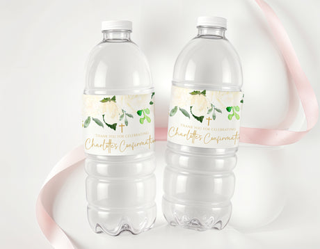Clear plastic water bottles with white floral personalised confirmation labels