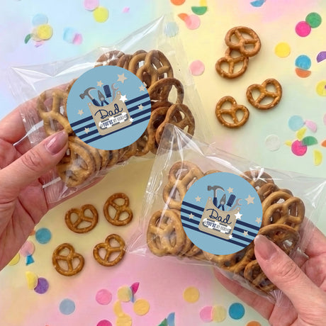 Personalised pretzel treat bag with pretzels and round “Dad” sticker