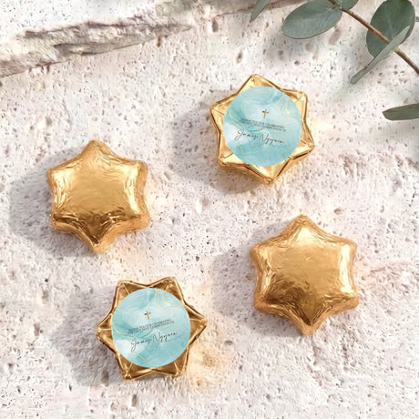 Gold foil star chocolates with cross label, set of four foil-wrapped stars