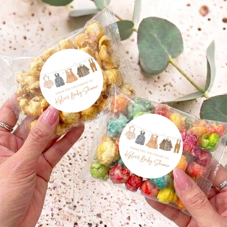 Popcorn treat bag with round white label and multicolor popped corn, in clear crinkle wrap