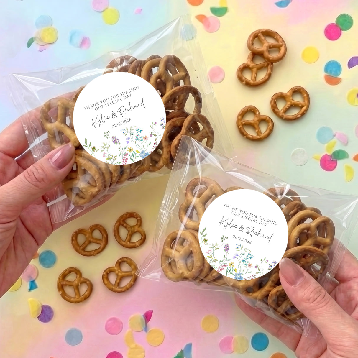 Personalised pretzel bags with brown pretzels and round floral thank-you labels