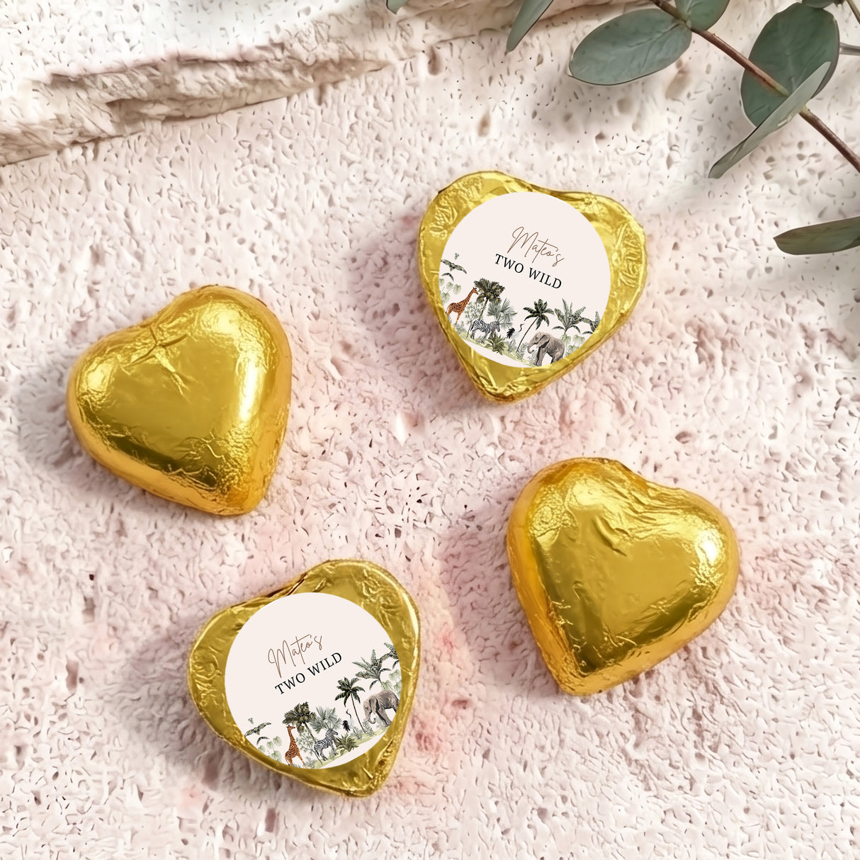 Gold foil chocolate hearts with “Two Wild” personalised round label