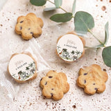 Personalised choc chip cookies with jungle-themed round labels and several cookies