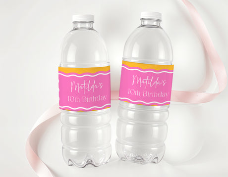Personalised 10th birthday water bottle labels on clear bottles, pink and orange wavy design.