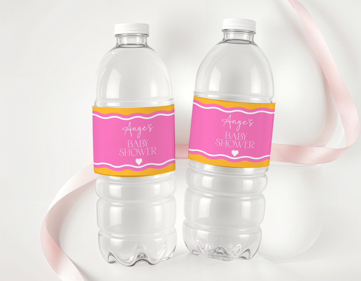 Two clear drink bottles with pink and orange wavy baby shower personalised labels
