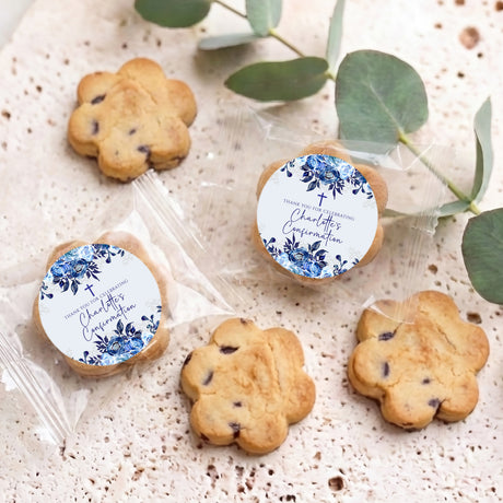 Pack of personalised confirmation choc chip cookies with blue floral round message labels