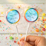 Kids birthday personalised lollipops with blue marble labels and rainbow rim, on clear wrappers