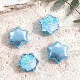Blue foil-wrapped chocolate stars, six-point shapes with blue name label.