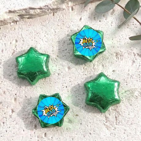 Foil-covered chocolate stars with blue “Best Dad Ever” label, green foil, five pieces