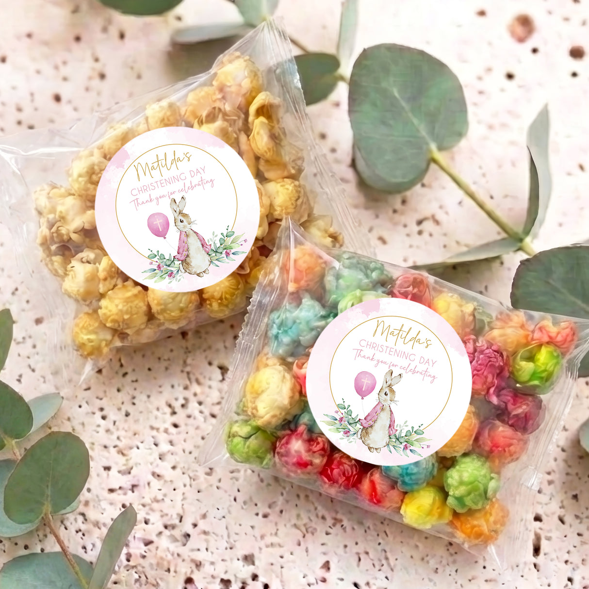 Clear Christening popcorn bag with round bunny label and pastel popcorn mix