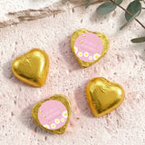 Gold foil heart chocolates with personalised baby-bee shower label on two hearts