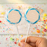 Personalised wedding lollipops with blue swirl tops and beige thank-you labels