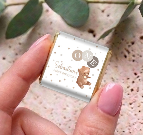 Personalised mini chocolates: silver wrapper, white panel, bear illustration, 'ONE' and 'Sebastian'