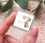 Personalised mini chocolates with white wrapper, bear graphic, 'ONE' emblem, and 'Sebastian' text