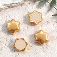 Beige foil-covered chocolate stars with round name tag toppers