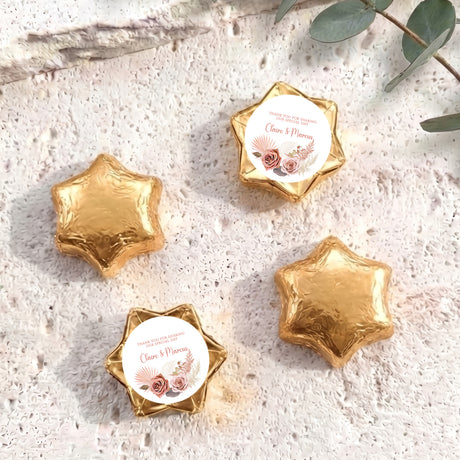 Gold star-shaped foil chocolate favours with personalised thank-you note