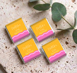 Set of personalised mini chocolate favors, pink/yellow wrappers with birthday message text