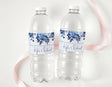 Personalised water bottle labels with blue floral roses and custom names on clear bottles