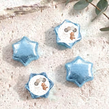 Blue star foil balloons with round baby shower label and bear design