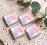 Four personalised mini chocolates with pink purple marble wrappers and 12th Birthday text