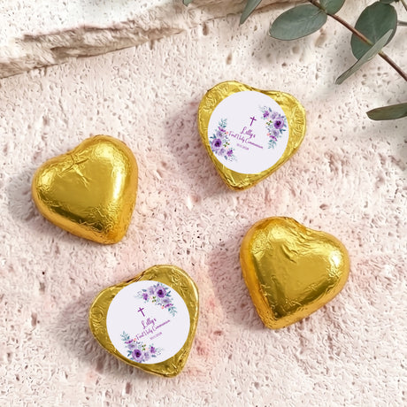 Foil-covered chocolate hearts with gold finishes, floral cross message medallions