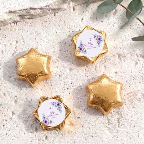 Gold foil chocolate stars with floral cross Communion label on a round centre card