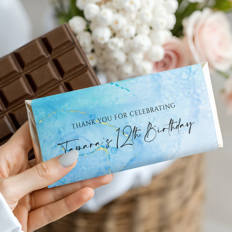 Birthday chocolate bar with blue watercolor marble wrapper, gold speckles, 'Thank you' text