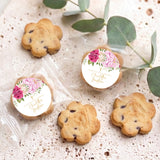 Assorted mini chocolate chip cookies with two floral personalised round labels