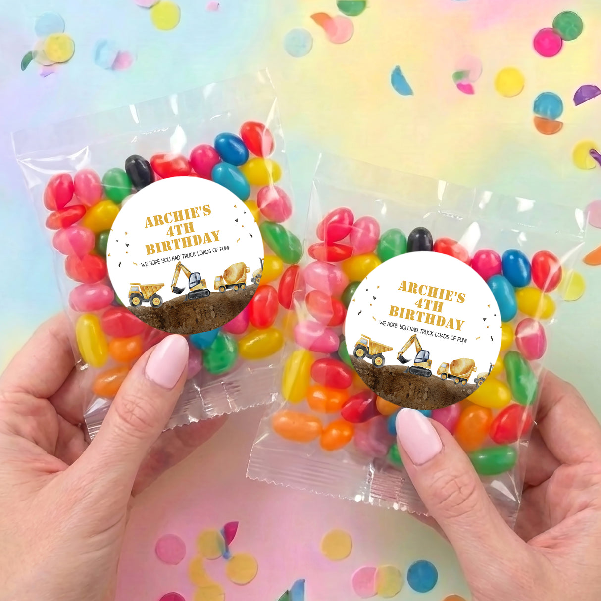 Pair of personalised jelly bean bags in clear wrappers, colorful beans, round birthday labels