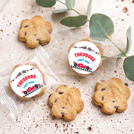 Personalised choc chip cookies with two round 'Theodore' labels on clear wraps