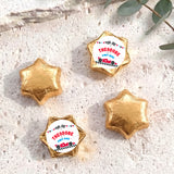 Personalised foil chocolate star set with gold foil and “THEODORE” label