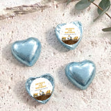 Foil-covered chocolate hearts in light blue with birthday label featuring a construction truck