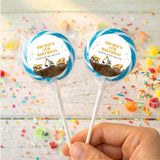 Personalised lollipops with ARCHIE'S BIRTHDAY truck labels, two blue-ring sticks