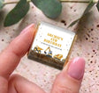 Personalised mini chocolates with construction trucks; “Archie’s 4th Birthday” on wrapper