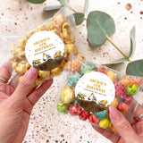 Personalised popcorn bags: 'Archie's 4th Birthday' circles with construction trucks