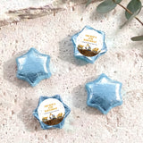 Foil-covered chocolate star sweets in light blue, with birthday foil label