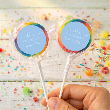 Personalised baby blue wedding lollipops with round love message labels, rainbow rim