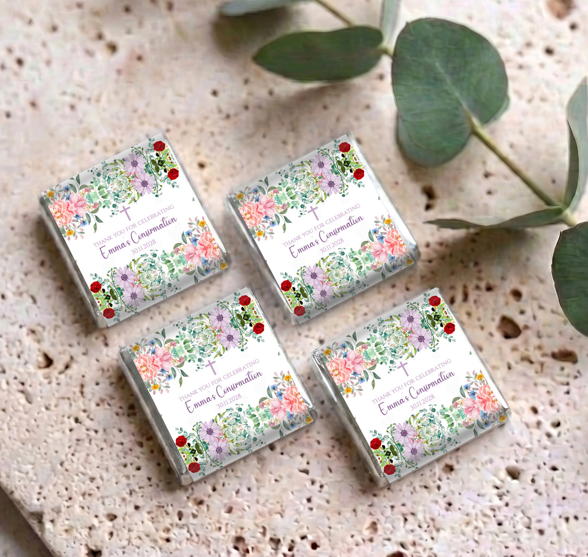 Four personalised mini chocolates with floral Confirmation thank-you design on surface