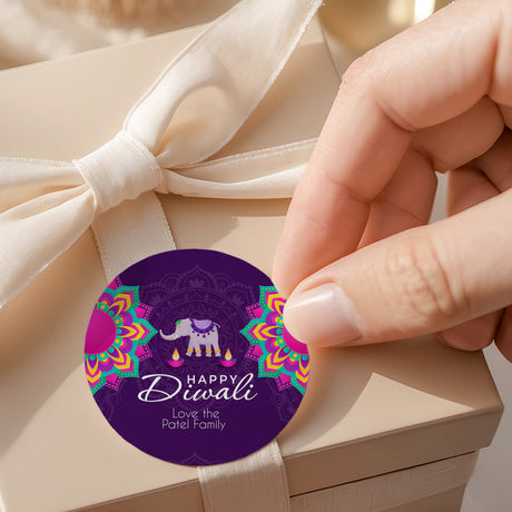 Round purple Diwali elephant label sticker with 'Happy Diwali' text and decorative border